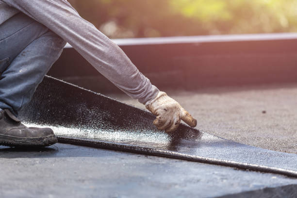 Professional Basement Waterproofing technician working in Upper Falls, MD